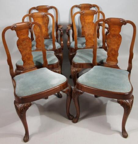 A set of six (4+2) George I style walnut dining chairs