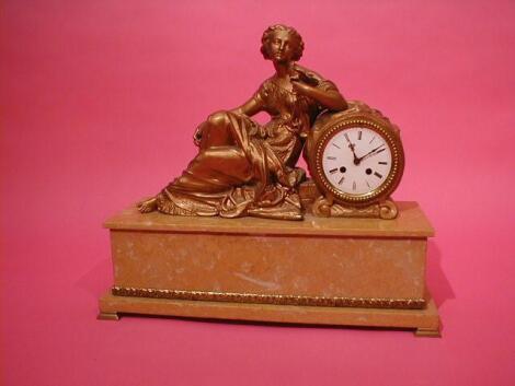 A French brown marble figural mantel clock