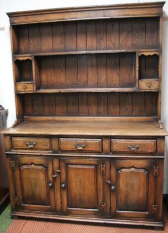 A 20thC Titchmarsh & Goodwin Jacobean style oak dresser