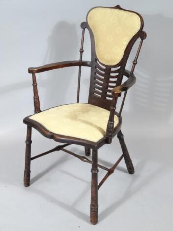 An early 20thC stained Arts and Crafts occasional chair