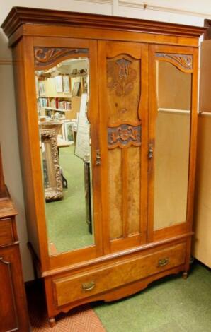 A late 19thC walnut double door wardrobe