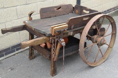 A wooden porter's barrow