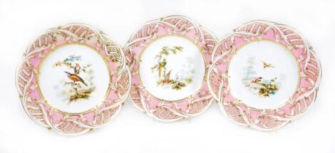 A set of three mid 19thC porcelain pink ground reticulated plates