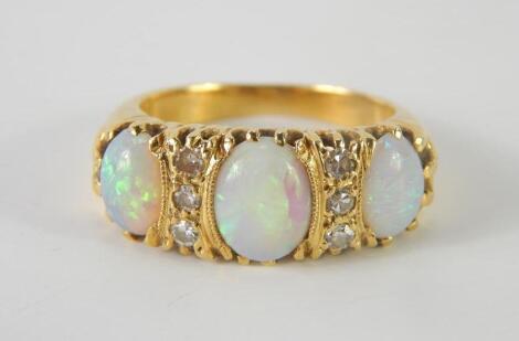 An opal three stone ring