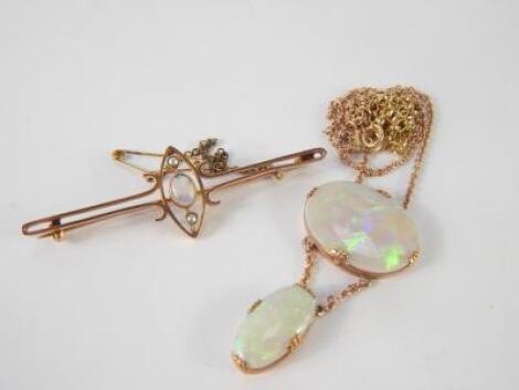 An opal necklace of double oval form