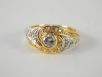 A diamond ring in a swirl design