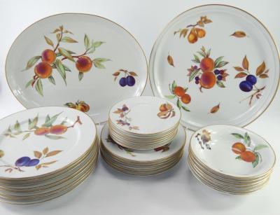 A Royal Worcester part dinner service decorated in the Evesham pattern