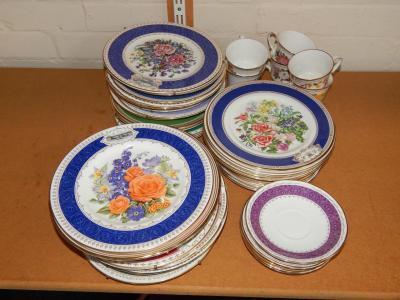 A group of Wedgwood Spode and Royal Doulton botanical porcelain plates