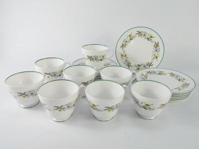 A Shelley porcelain part tea service decorated with blossom