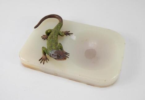 A 20thC cold painted figure of a lizard