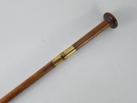 A Hittadu turned hardwood and brass mounted sword stick