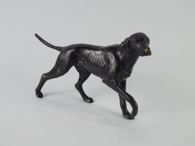 A bronze sculpture of a labrador