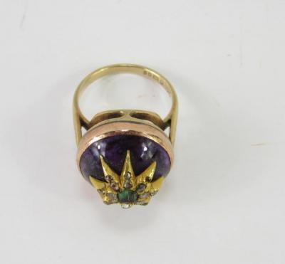 A 9ct gold and cabochon amethyst ring