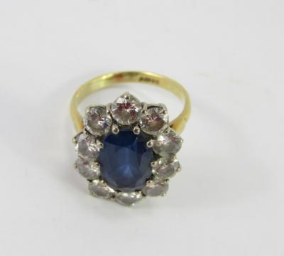 An 18ct gold sapphire and diamond ring