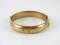 A 9ct gold bangle