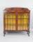 An early 20thC walnut bow fronted display cabinet