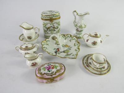 A Coalport miniature teaset and French porcelain trinkets