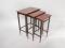 A set of three inlaid mahogany nesting tables