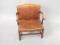 A mahogany framed low armchair