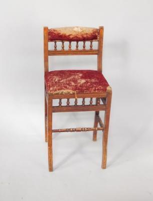 An Edwardian stained beech framed high chair