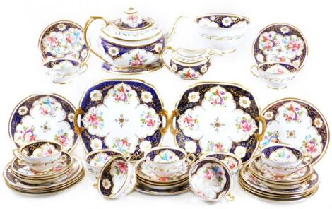 A 19thC Rockingham marked porcelain tea service