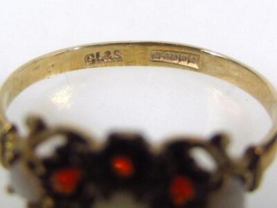 A ladies 9ct gold opal and garnet dress ring - 2