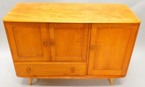 An Ercol light elm sideboard