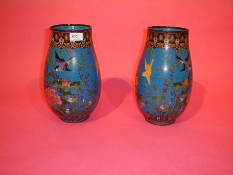 A pair of 19thC Japanese cloisonn£ baluster vases