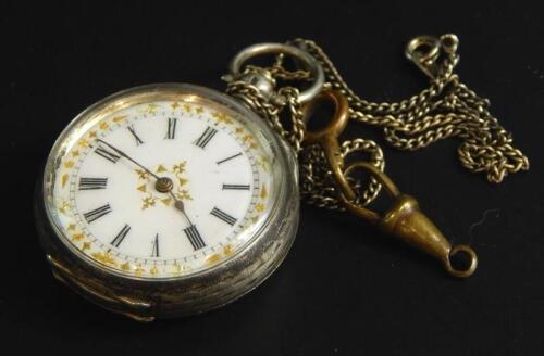 A silver fob watch