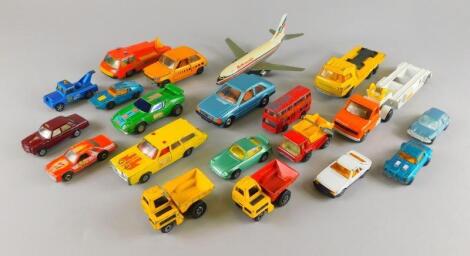 A collection of playworn die cast vehicles