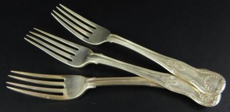 A set of three George V Kings pattern silver dessert forks