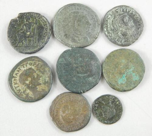 A collection of eight Roman and Roman style coins