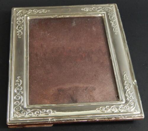 A modern silver rectangular photograph frame