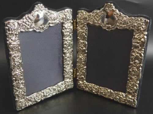 A modern silver two part photograph frame