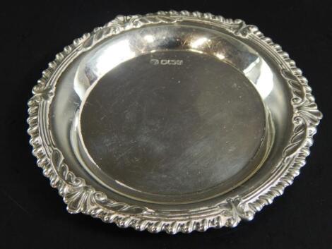 An Elizabeth II circular silver pin tray