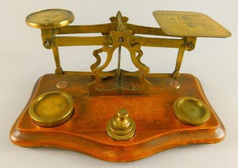 A set of late 19th/early 20thC mahogany and brass postal scales