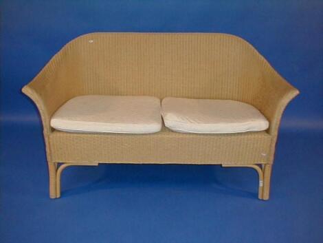 A Lloyd Loom type two seater sofa