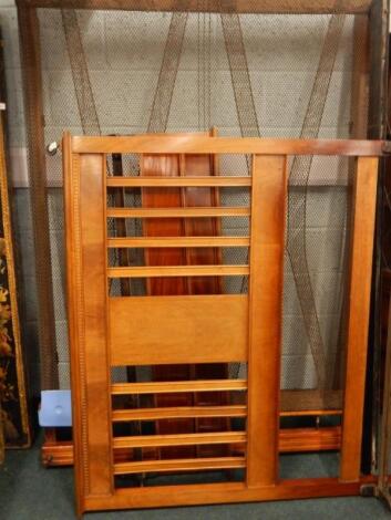 An Edwardian mahogany double bed head and foot