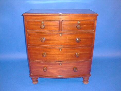 A Victorian mahogany bow front chest of two short and three long graduated