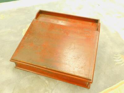 A Victorian stained pine slope top table desk