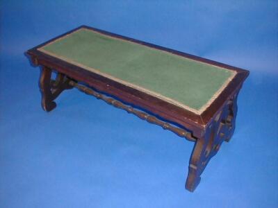 A Victorian mahogany window seat with loose squab