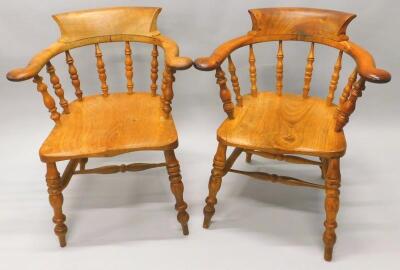 A near pair of 19thC Windsor captain's chairs