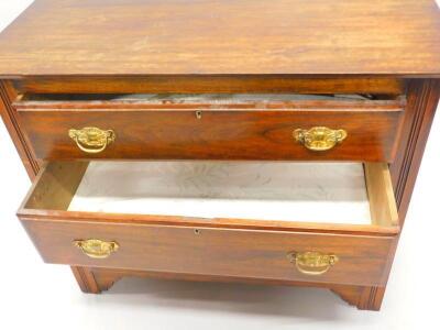 A Victorian walnut chest of three drawers - 2