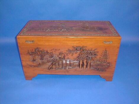 A carved camphor wood chest