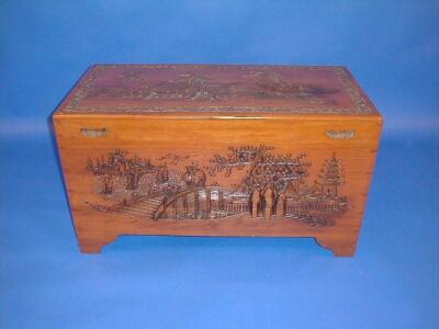 A carved camphor wood chest