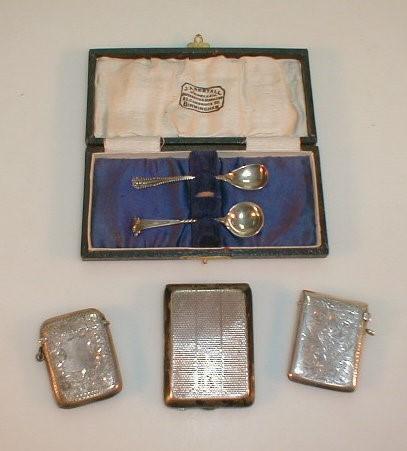 Three small silver vesta cases and two salt spoons