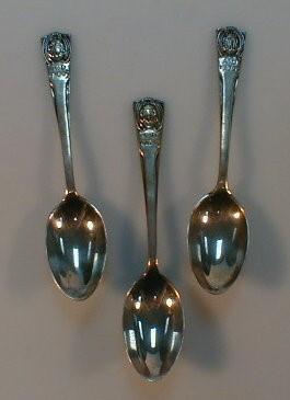 Three commemorative silver teaspoons commemorating the reign of George V 1910 - 1935