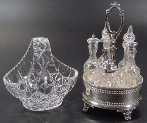 An Edwardian silver plated and glass bottle cruet set