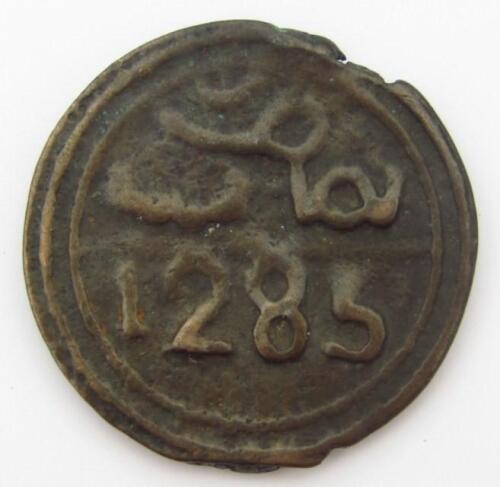 A circular iron token