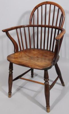 A 19thC yew wood and elm low back Windsor chair